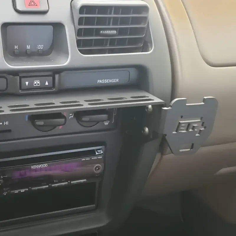 3rd Gen 4Runner console mount with a mounted radio and TEQ logo, emphasizing its side accessory compatibility and branding.