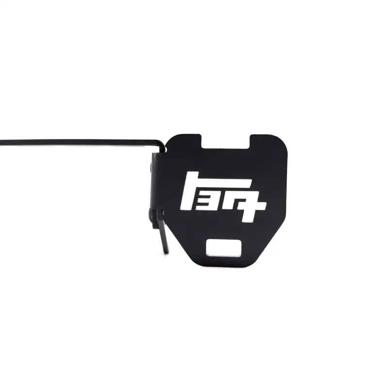 Close-up of the TEQ-branded side mount attachment for the 3rd Gen 4Runner console mount, highlighting its precision engineering.