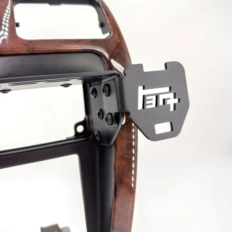 Close-up of the 3rd Gen 4Runner console mount with TEQ logo, emphasizing its modular design and side accessory compatibility.