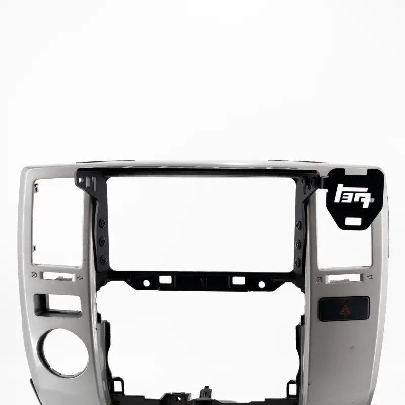 Front view of 4th Gen 4Runner modular dash mount on a console frame, featuring a TEQ Offroad logo and accessory mounting slots.