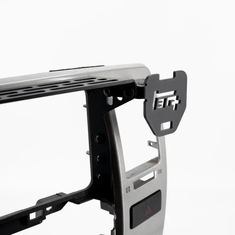 4th Gen 4Runner modular dash mount with TEQ Offroad logo attachment, designed for mounting walkie-talkies or control panels.
