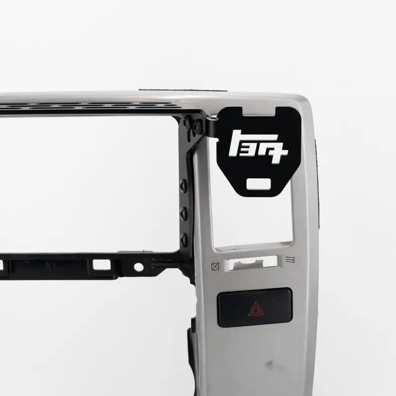 4th Gen 4Runner modular dash mount with TEQ Offroad logo attachment, designed for mounting accessories like radios or phones.