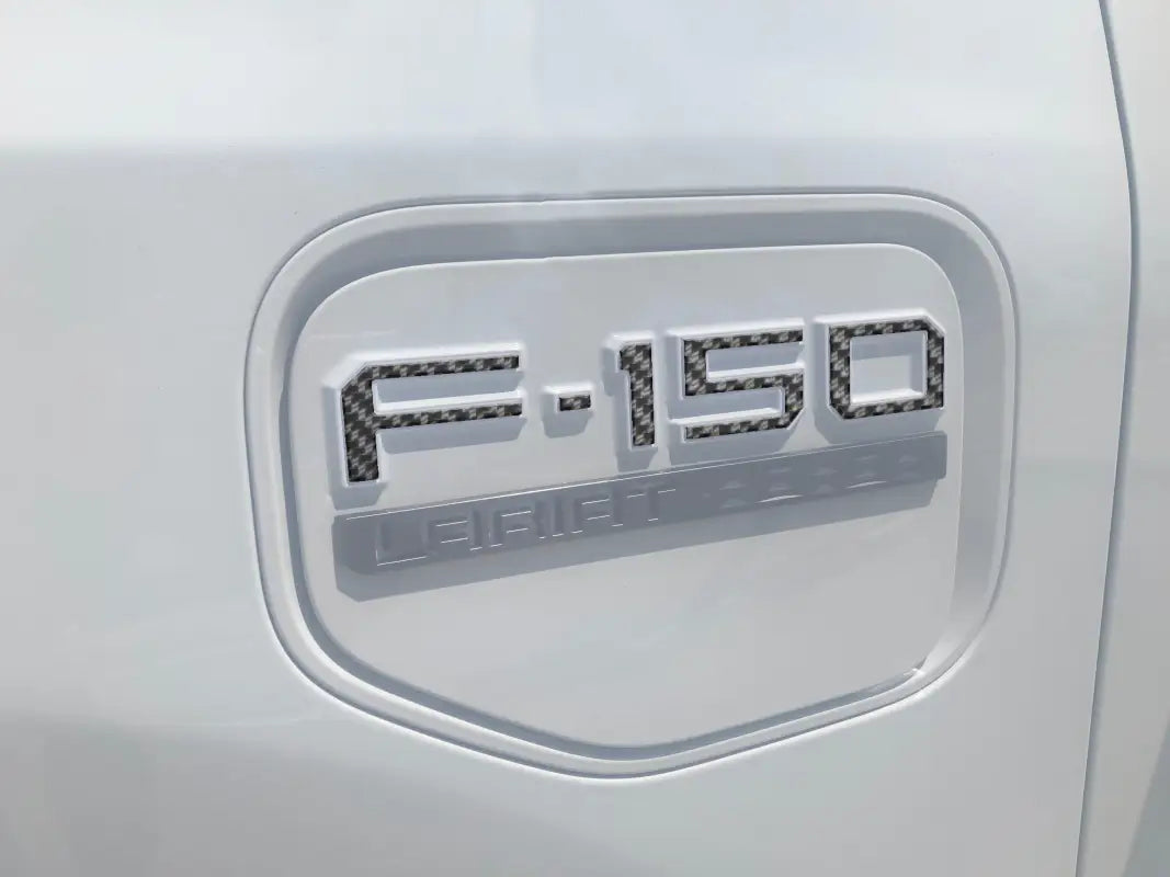 White F-150 Lariat emblem on charge port lid for Ford F-150 Lightning 2022-2024