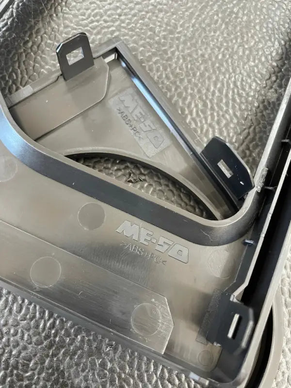 Close-up of the Tundra Chrome Delete Kit's underside, highlighting durable ABS-PC material and secure mounting clips.