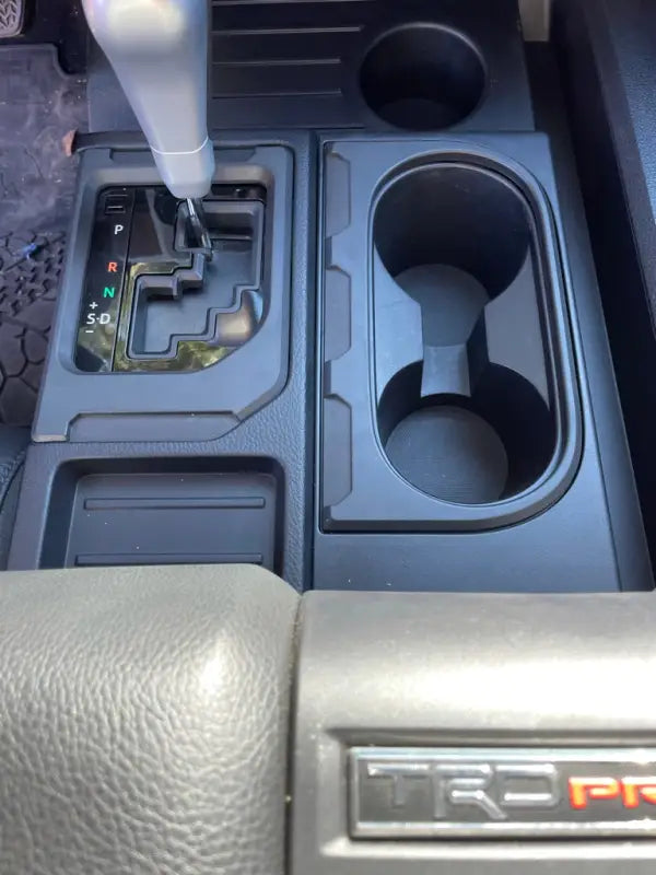 Tundra Chrome Delete Kit installed on a console, replacing chrome trim with black accents for a refined interior aesthetic.