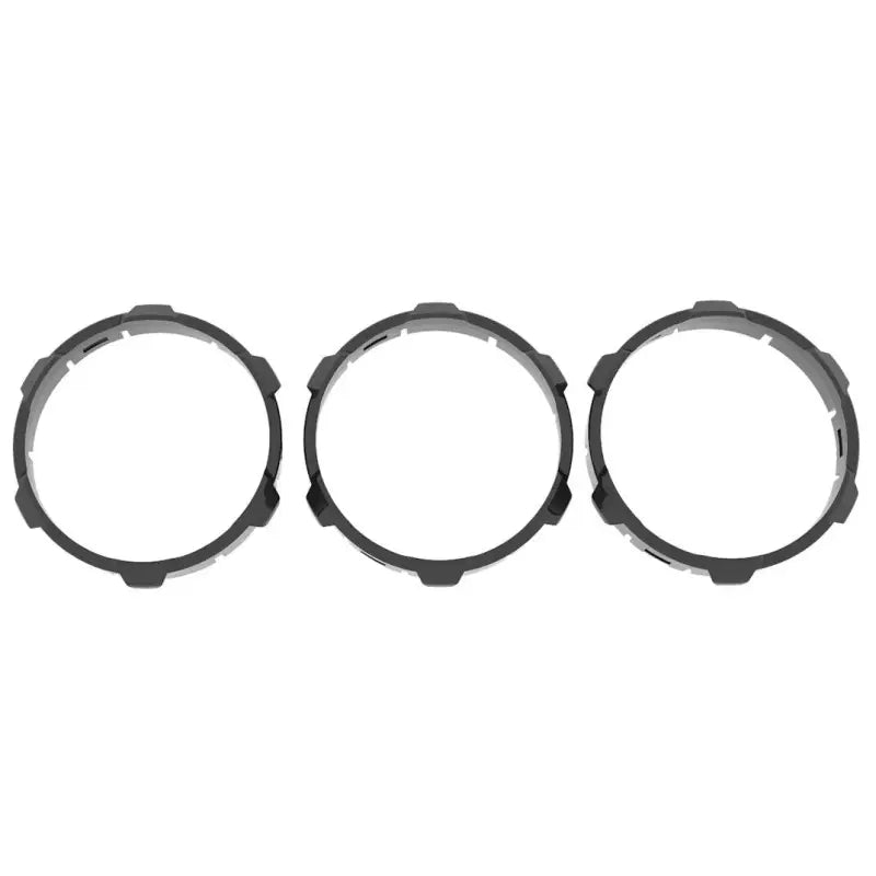 Black climate control ring inserts for 2016-2023 Toyota Tacoma, designed for manual and digital versions.