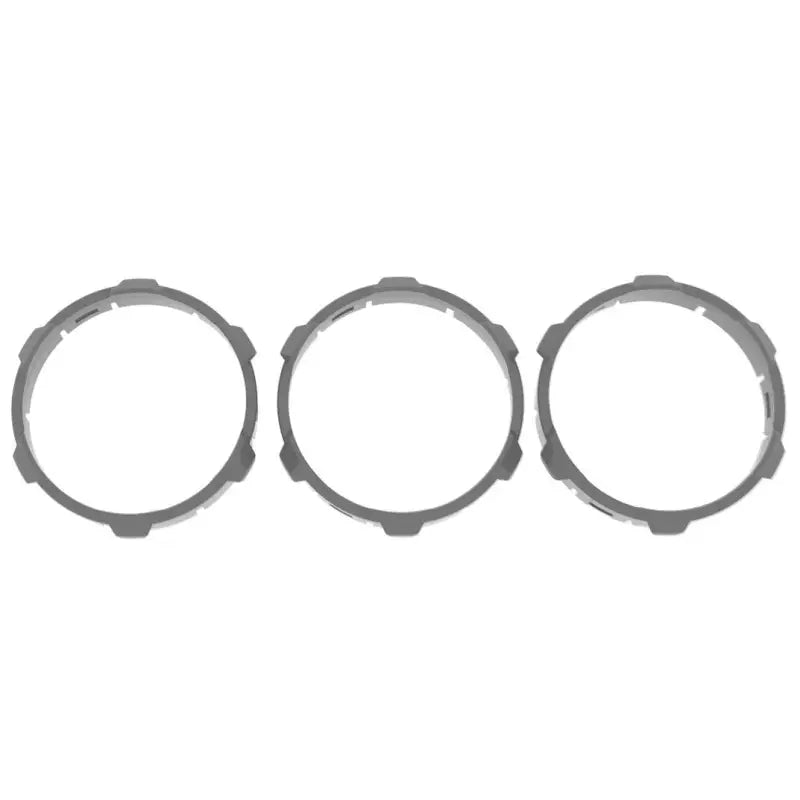 Dark gray climate control ring inserts for 2016-2023 Toyota Tacoma, injection-molded ABS plastic.