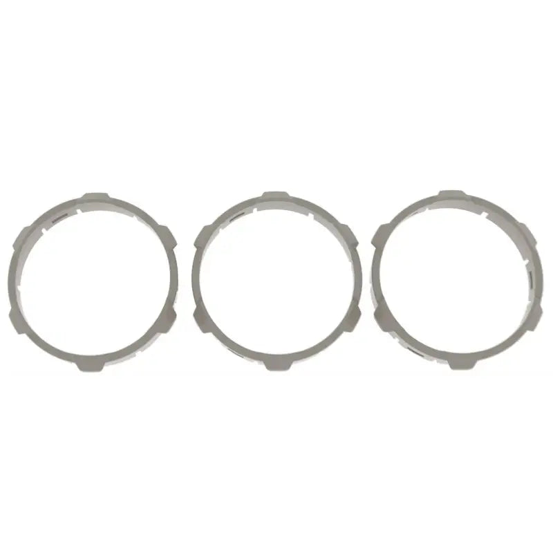 Tan climate control ring inserts for 2016-2023 Toyota Tacoma, designed for manual and digital versions.