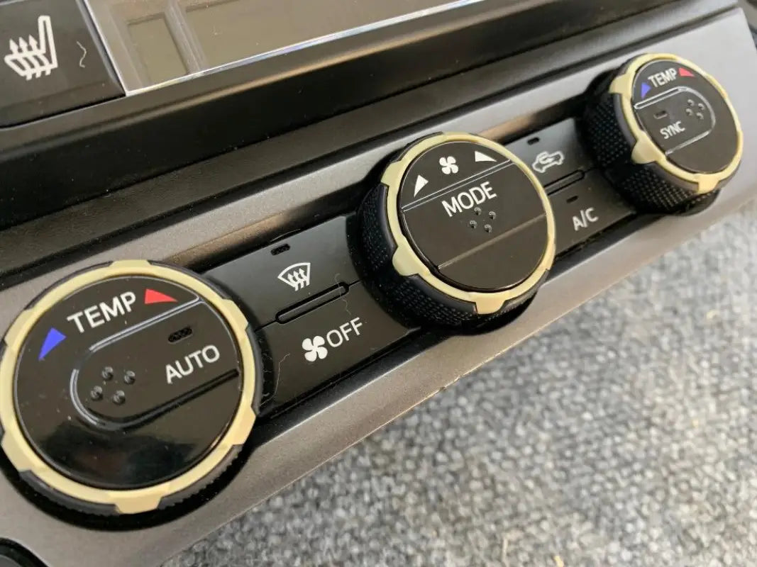 Green climate control rings for 2016-2023 Toyota Tacoma, injection-molded ABS plastic, set of three.