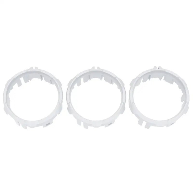 White climate control rings for 2016-2023 Toyota Tacoma, injection-molded ABS plastic, set of three.