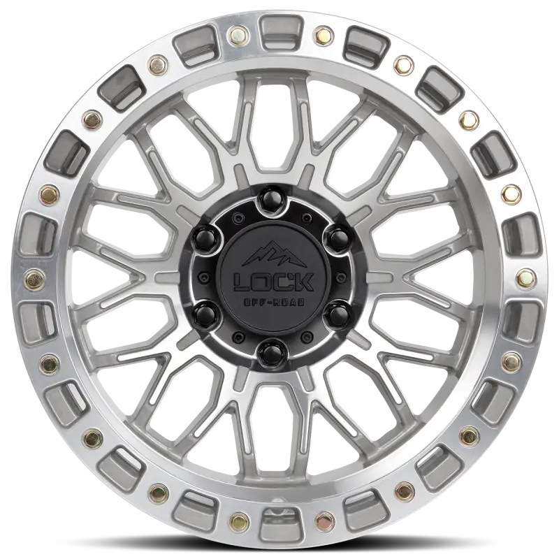 Front view of Combat Machine Face Polish wheel featuring a bold mesh-block pattern, vented chambering, and matte finish. Ideal for off-road vehicles.