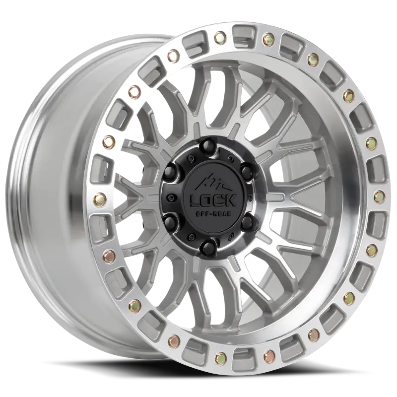Combat Machine Face Polish wheel with bold mesh-block pattern, vented chambering, and TACT finish. Durable off-road design for military-grade performance.