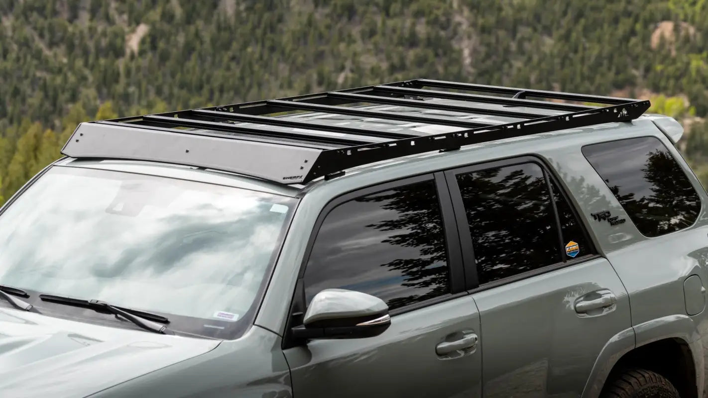 Close-up of Crestone Sport Roof Rack on a 4Runner, featuring adjustable crossbars and accessory mounting options for cargo.