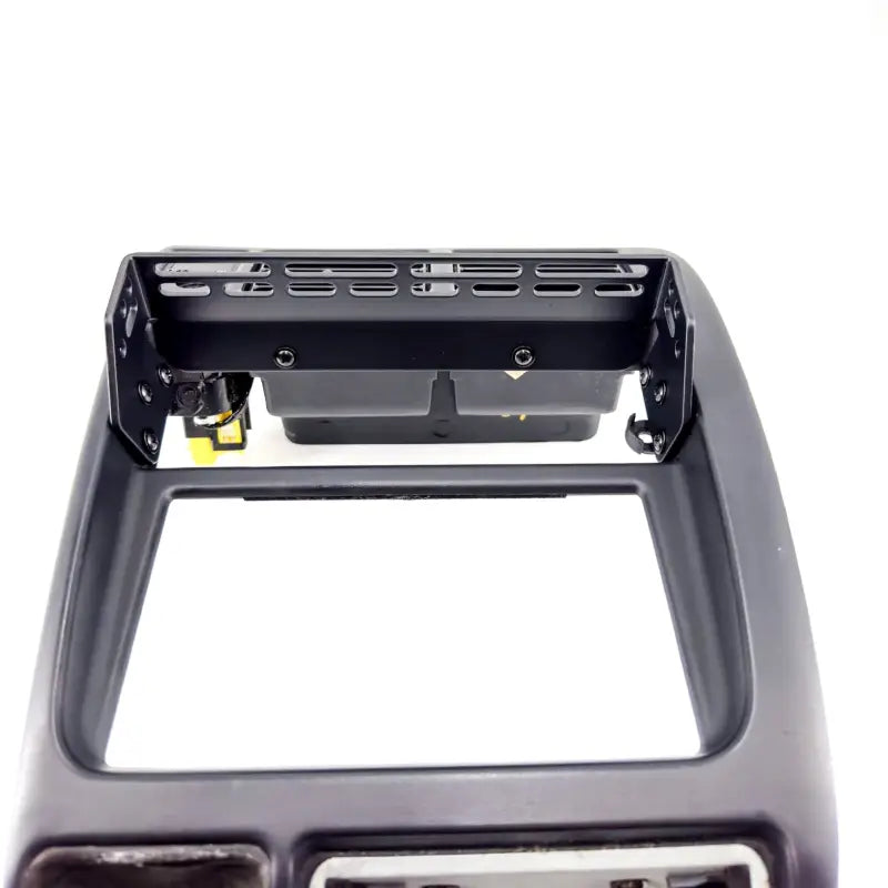 Top-down view of Tacoma modular console mount, highlighting laser-cut slots and sturdy construction for 98-04 dashboards.