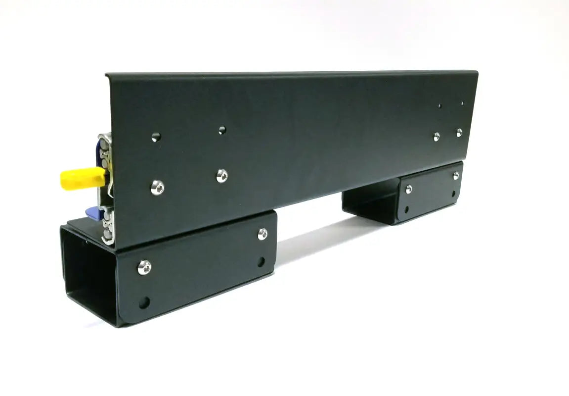Side view of DIY slide track mounted on riser blocks, highlighting adjustable height and robust design.