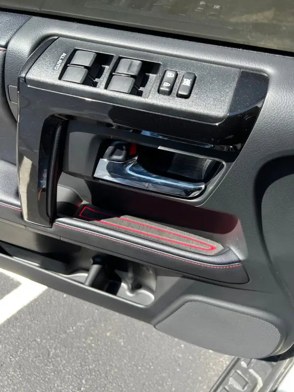 Close-up of door handle foam insert with red accent fitted on a Toyota 4 Runner, compatible with 2010-2024 models.