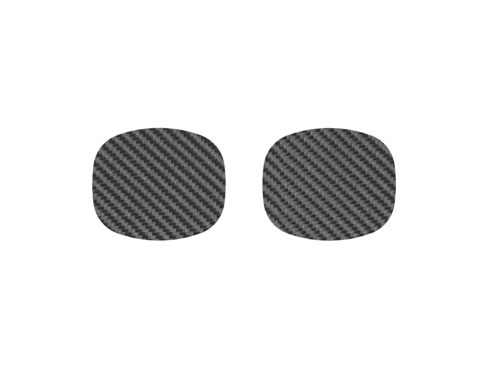 Pair of carbon fiber-style door handle protective inserts for Toyota Tacoma, compatible with 2005-2015 and 2024-up models.