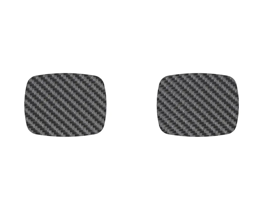 Two carbon fiber-style door handle protective inserts compatible with Toyota Tacoma and 4Runner models, shown on a white background.