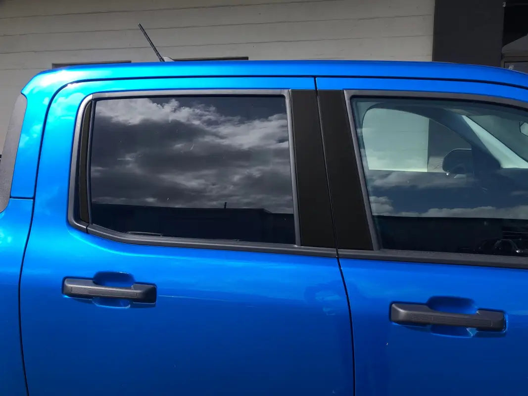 Blue pickup truck with door pillar accent overlays on Ford Maverick 2022-2024