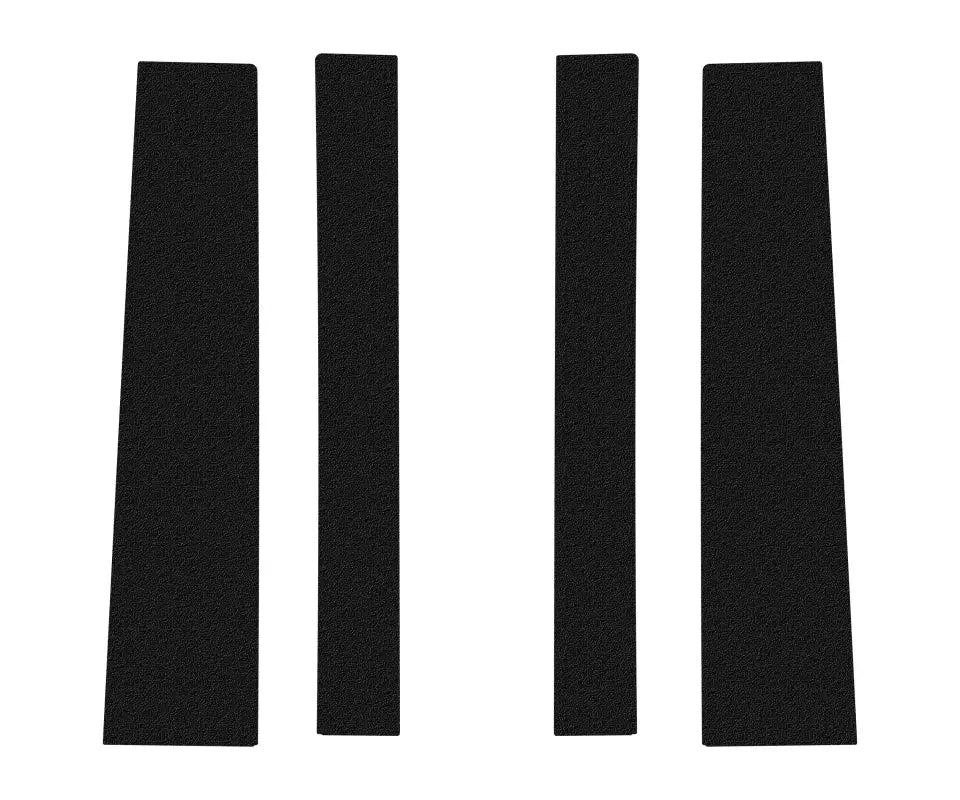 Set of four textured black door pillar accent trims for Toyota FJ Cruiser, designed for a custom fit and durable finish.