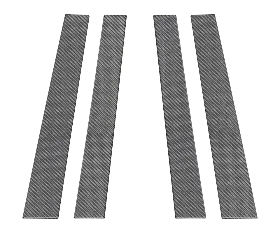 Set of four carbon fiber-style door pillar overlays designed to fit 2003-2009 Toyota 4Runner, enhancing exterior aesthetics.