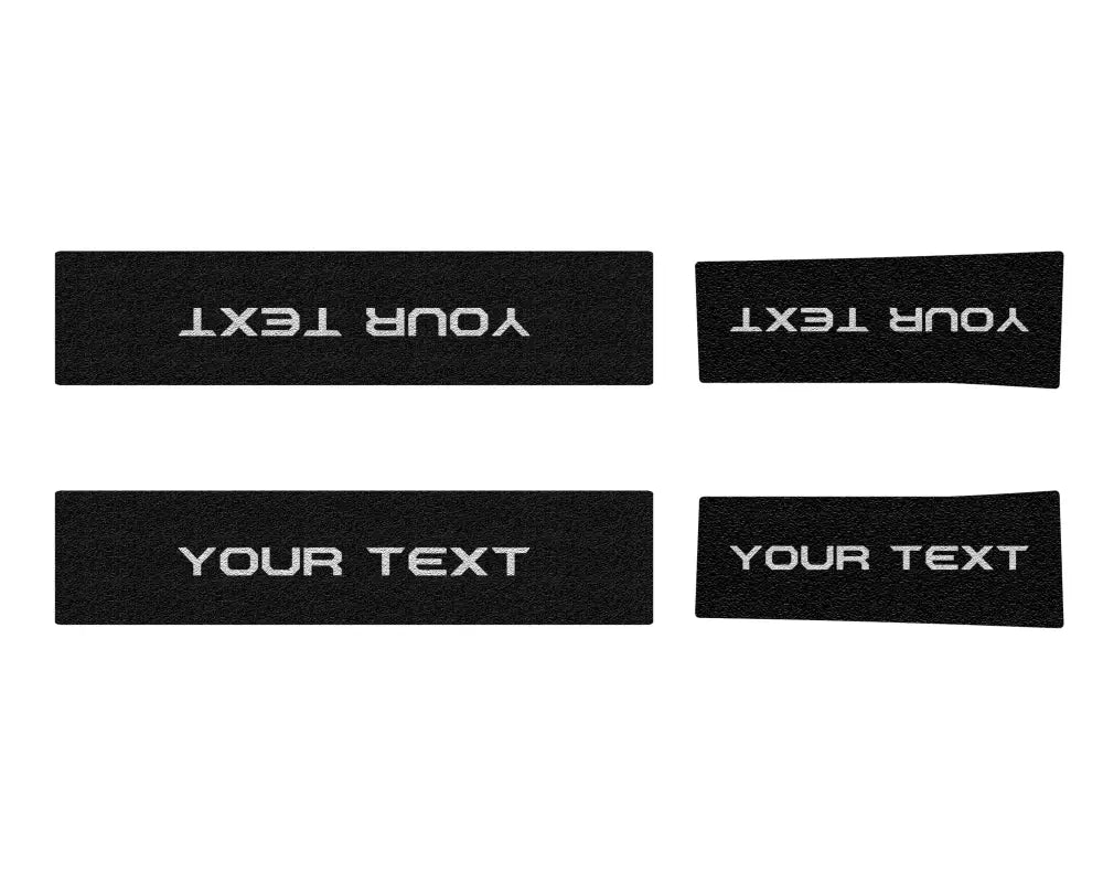 Black fabric labels on door sill protection overlays for 2021-2024 Ford Bronco Sport