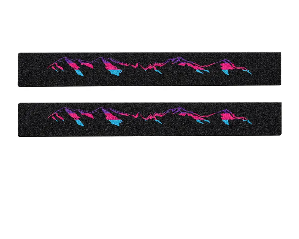 Pair of black textured door sill overlays with pink and blue mountain design for Toyota Tacoma 2005-2023, protective and colorful.