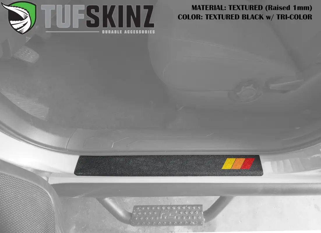 Textured black door sill overlay with tri-color design for 2005-2023 Toyota Tacoma, offering a raised, vibrant accent.