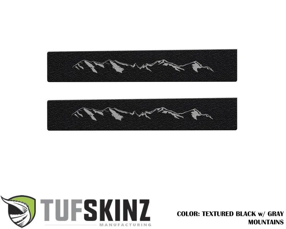 Black textured door sill overlays with gray mountain design for 2005-2023 Toyota Tacoma, durable and stylish interior protection.