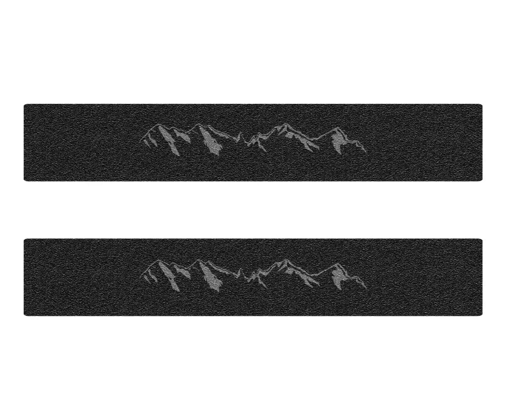 Black textured door sill protection overlays with mountain range design for Chevrolet Colorado