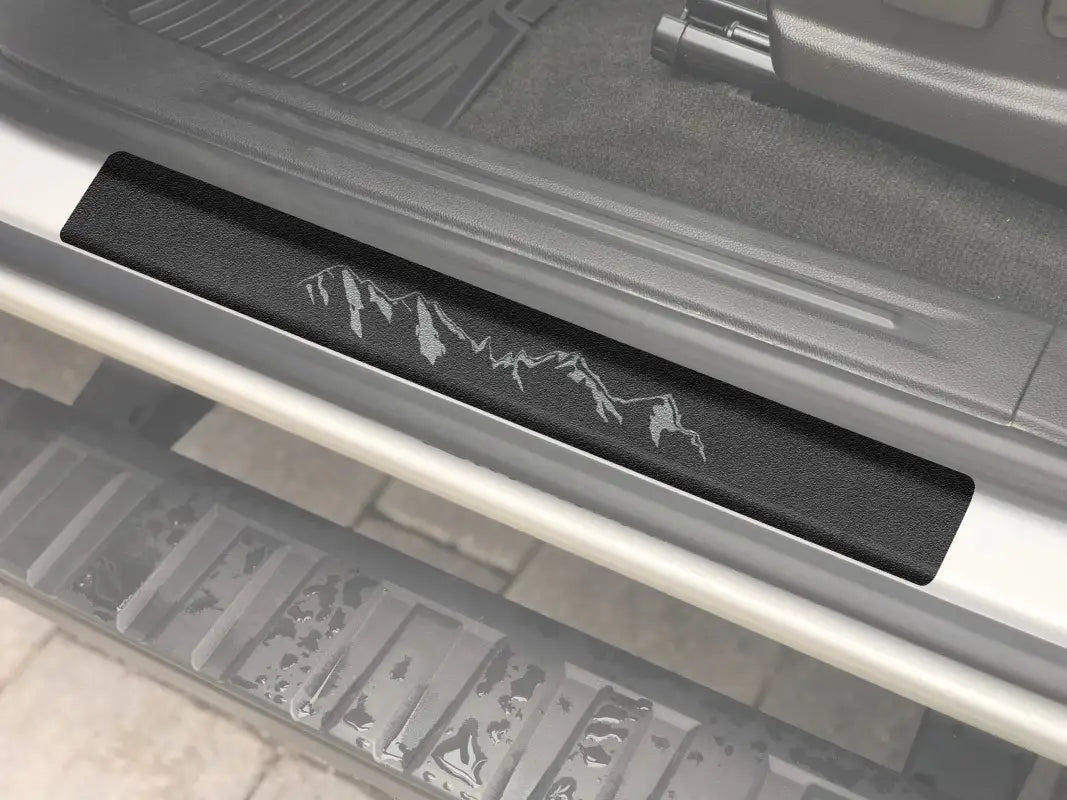 Black door sill protection overlay with mountain design for Chevrolet Colorado 2015-2022