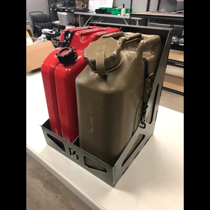 Dual Jerry Can Carrier holding red and green jerry cans, showcasing compatibility with various can sizes and secure fit.