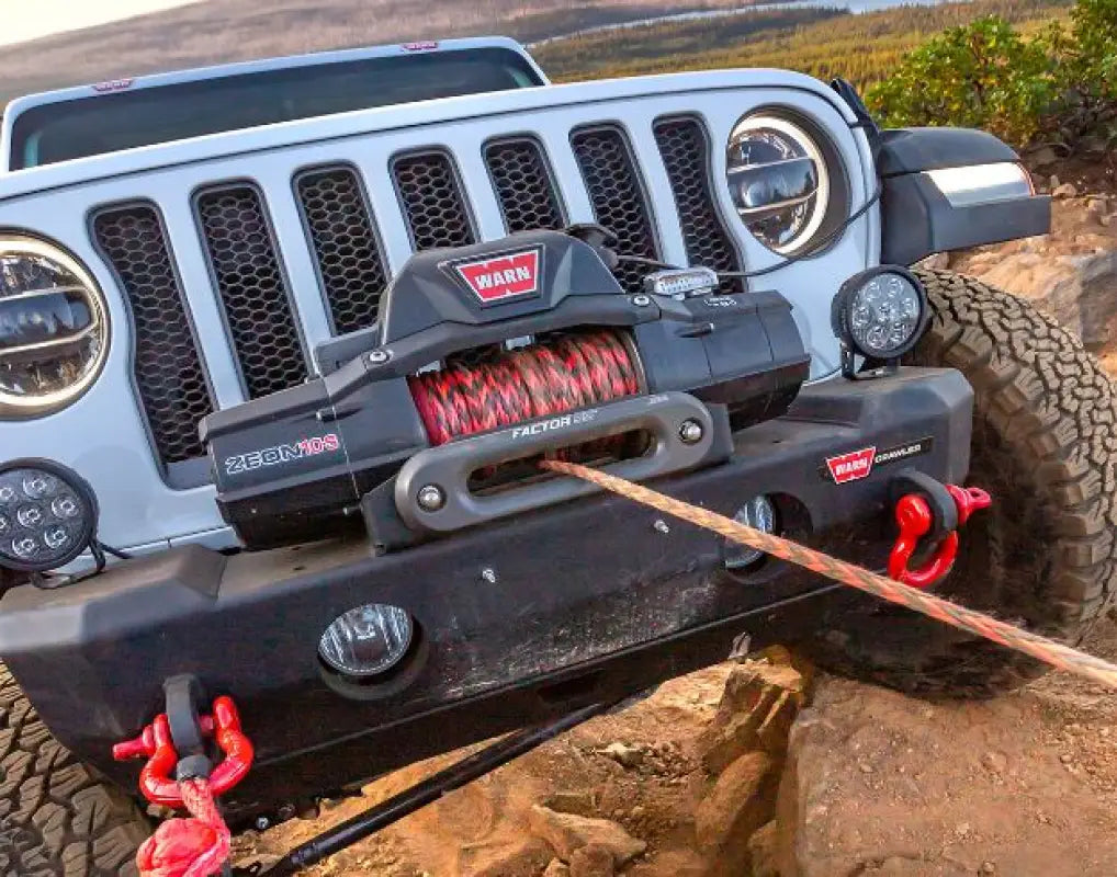 Factor 55 Fairlead installed on a winch-equipped off-road vehicle, showcasing its durable design and ability to handle side pulls effectively.