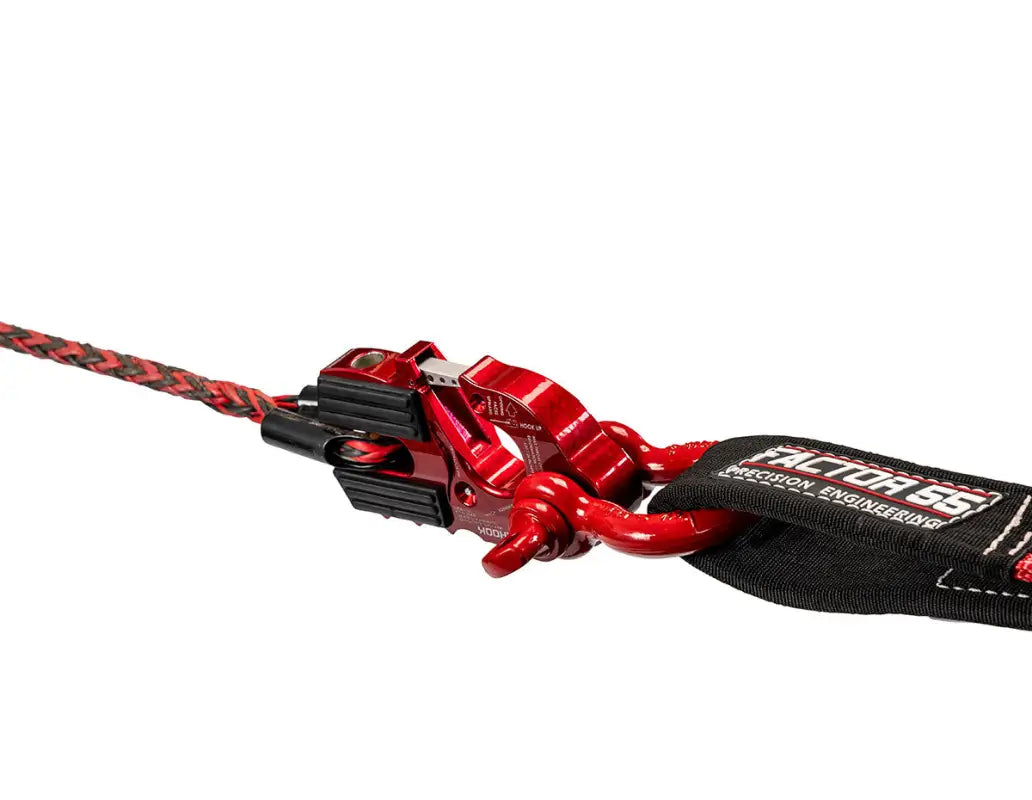Red Factor 55 Ultra Hook attached to a winch rope, demonstrating its closed system design and compatibility with off-road recovery gear.