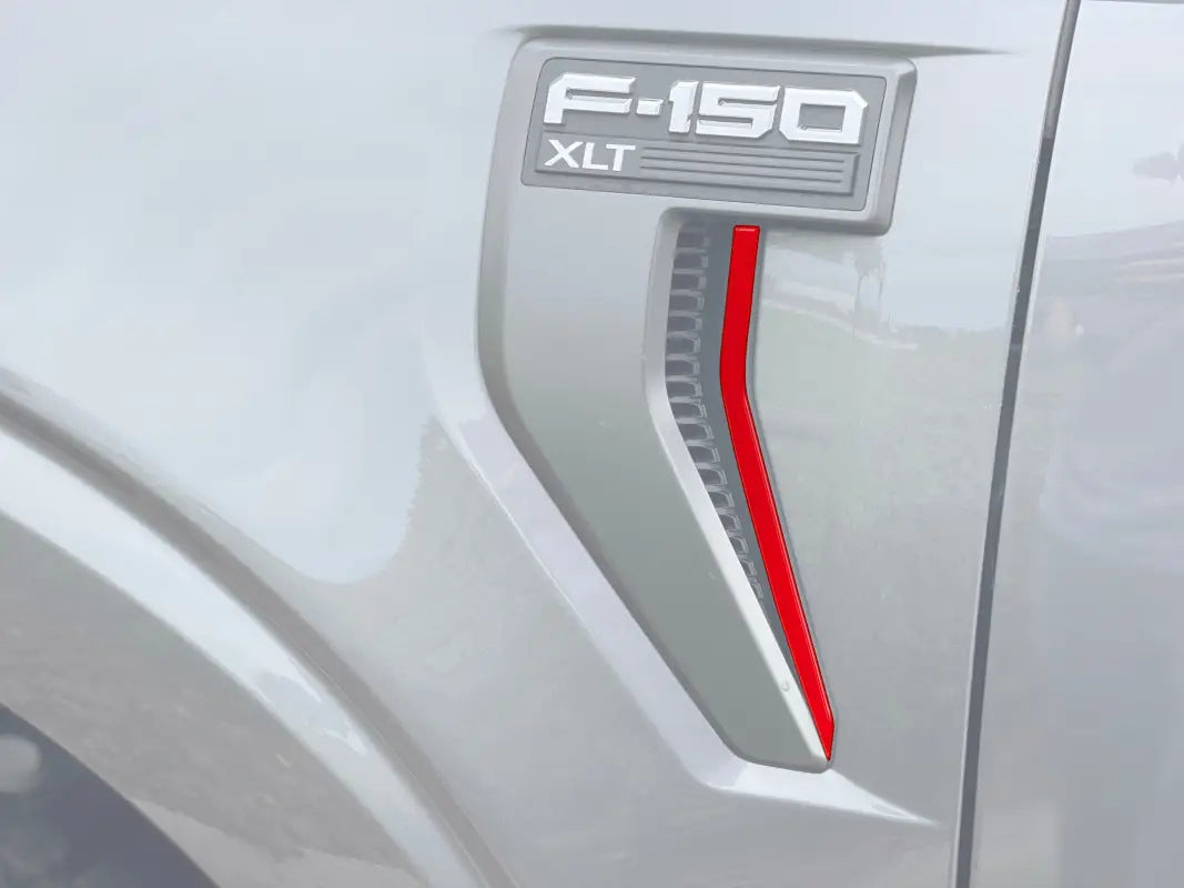 Silver F-150 XLT emblem on fender vent strip accent for Ford F-150 2021-2024