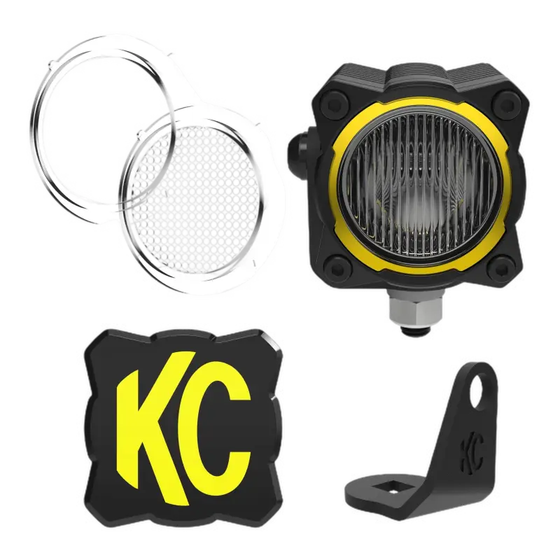 FLEX ERA® 1 Light Kit featuring a compact light pod with yellow accents, multi-beam lens, mounting bracket, and KC logo badge. IP68 rated for off-road use.