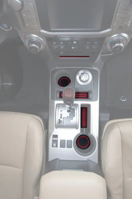 FOAM cup holder inserts installed in the center console of a Toyota 4Runner, showcasing a precise fit for models from 2010 to 2024.