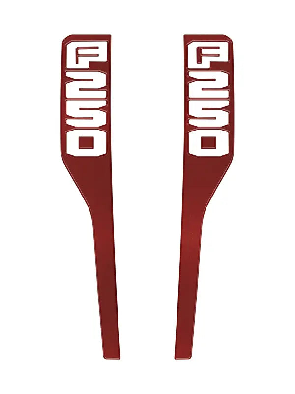 Pair of red Ford F250 fender emblem overlays for 2023-2025 Super Duty trucks