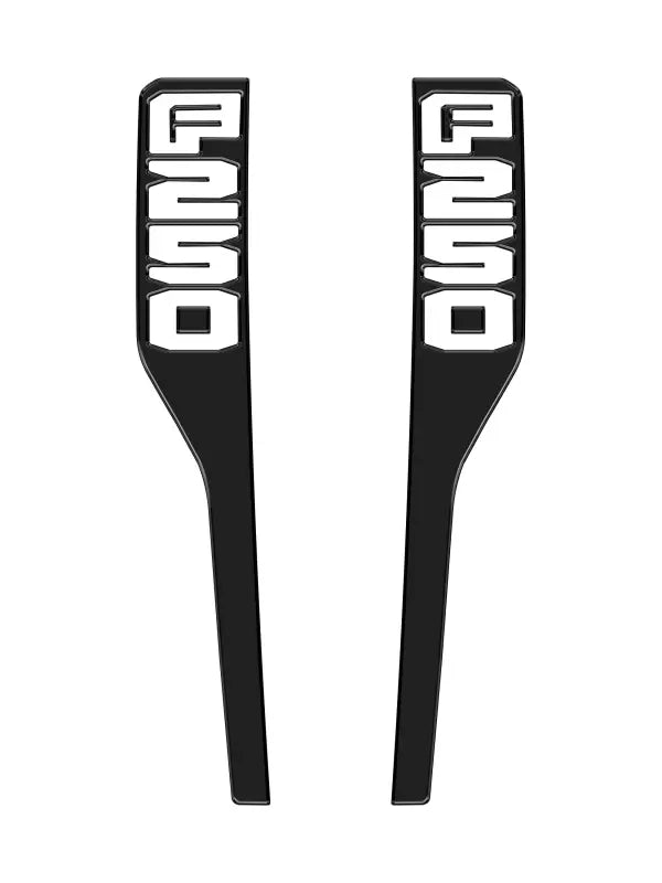 Two black F250 fender emblem overlays for 2023-2025 Ford Super Duty trucks