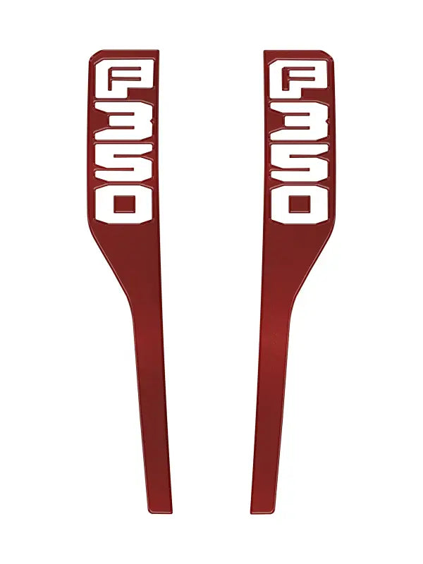Pair of red F350 fender emblem overlays for Ford Super Duty 2023-2025