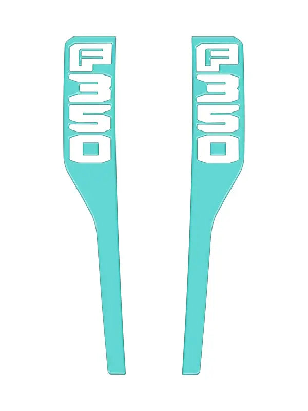 Two turquoise F350 fender emblem overlays for 2023-2025 Ford Super Duty trucks