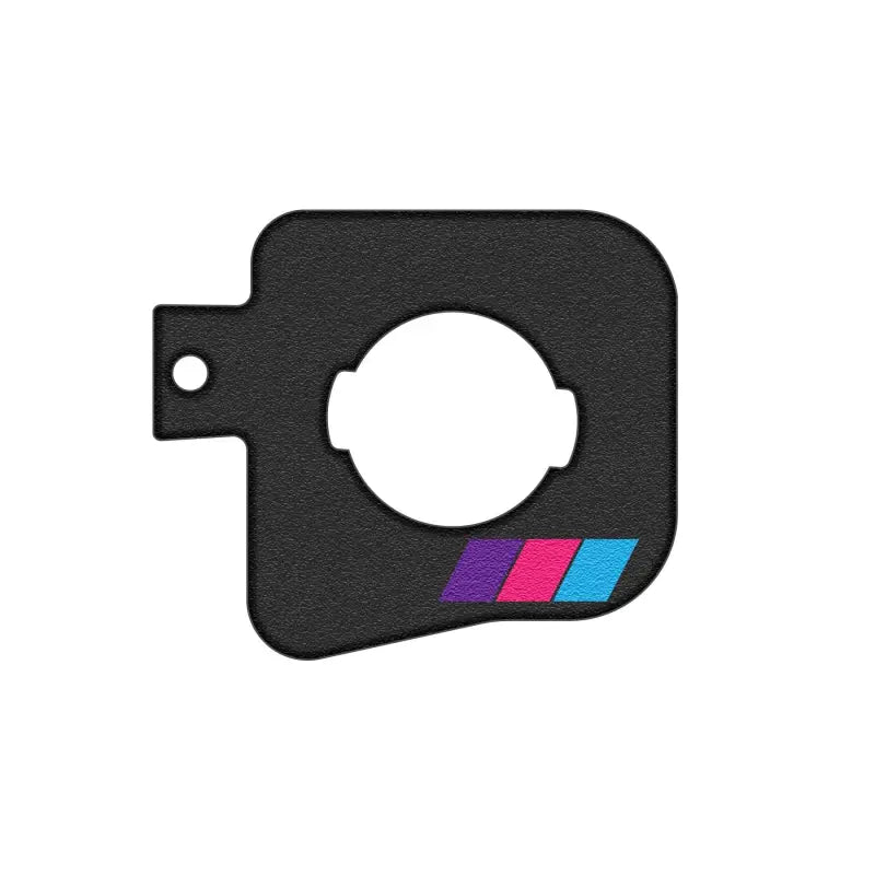 Gas cap holder insert with black and white American flag design, installed in Toyota Tacoma 2005-2023 fuel door.