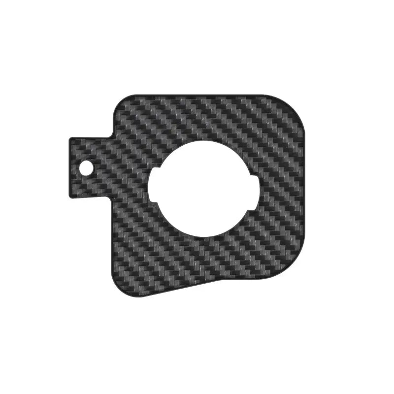 Gas cap holder insert with yellow, orange, and red diagonal stripes for Toyota Tacoma 2005-2023, installed.