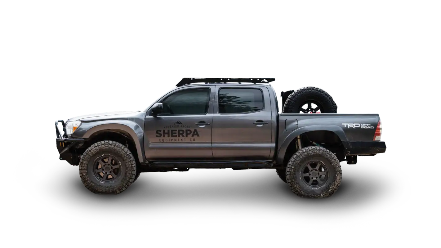 Gray off-road pickup truck with Grand Teton Sport roof rack for 05-23 Tacoma Double Cab