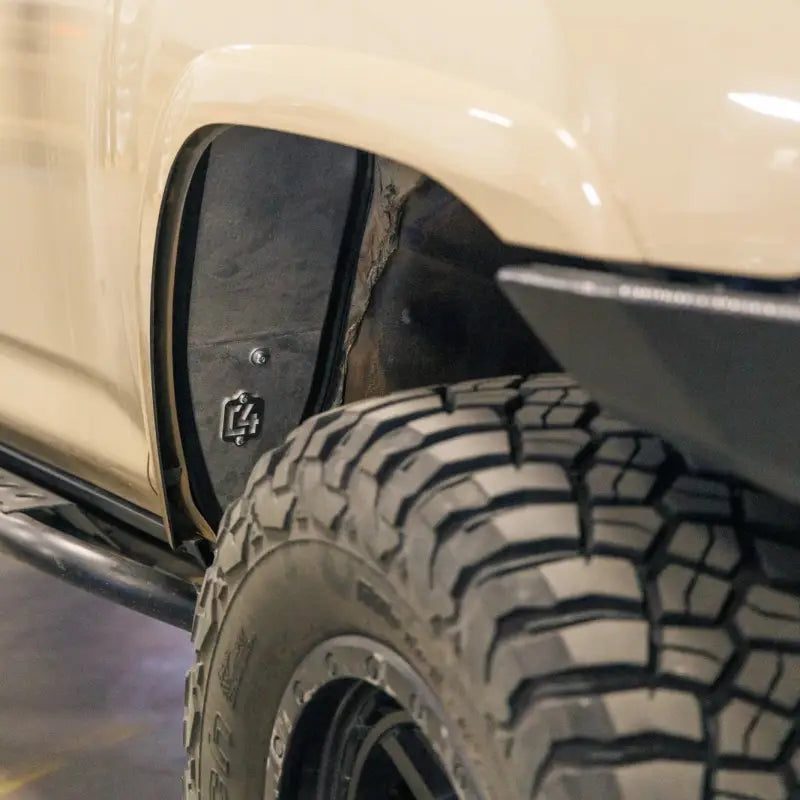 High clearance fender liner installed on a 5th Gen 4Runner, showcasing bolt-in fit and maximum tire clearance.