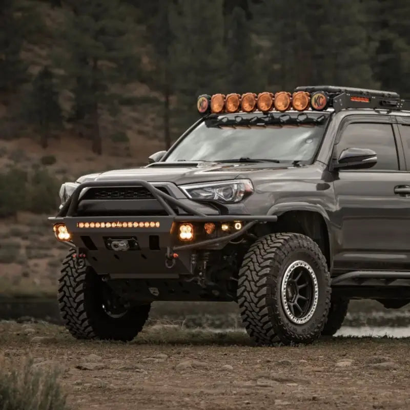 4Runner Hybrid Bumper installed on a 5th Gen Toyota 4Runner, featuring heavy-duty steel construction, winch mount, and LED light mounts.