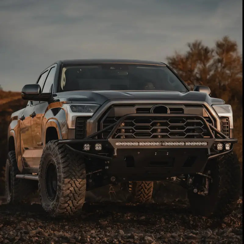 Tundra Hybrid Bumper installed on a 3rd Gen Toyota Tundra 2022+, featuring offroad-ready design with integrated skid plate and Baja light compatibility.