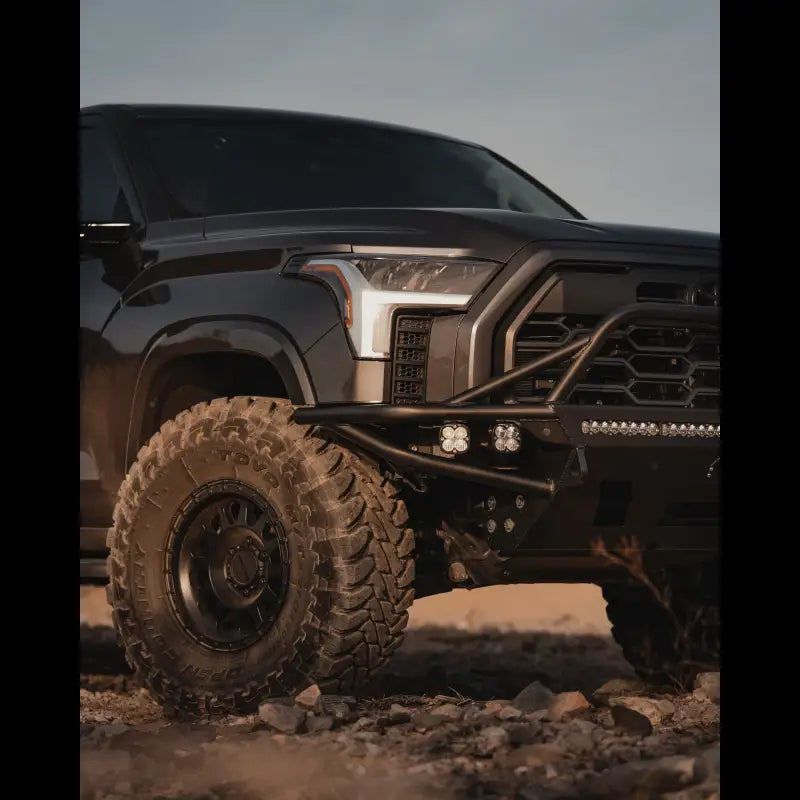 Close-up of Tundra Hybrid Bumper on a 3rd Gen Toyota Tundra 2022+, showcasing rugged construction, park sensor compatibility, and winch support.