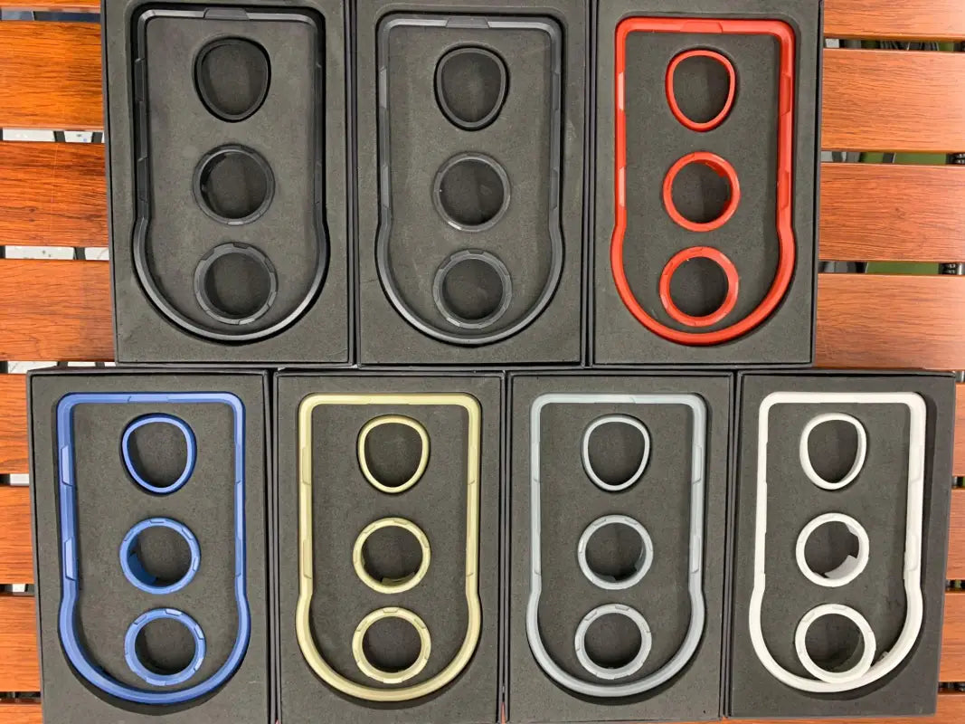 Top view of multiple Tacoma chrome delete kits in different colors, showcasing their design and compatibility with 2016-2023 models.