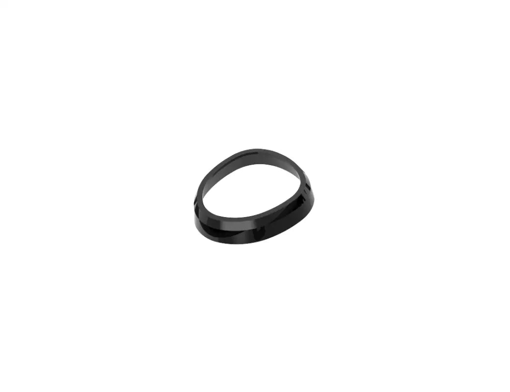 Black oval trim piece from the chrome delete kit for Toyota Tacoma 2016-2023, designed for dashboard customization.